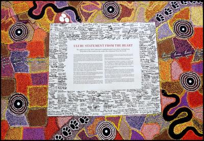 The signed Uluru Statement of the Heart with signatures and a broader look at the canvas art, which tells the highly significant story in its own right.