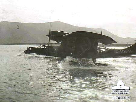 RAAF Catalina flying boat taxis along the Cairns waterfront in 1944, setting off on a long-range mission. Image: Australian War Memorial.